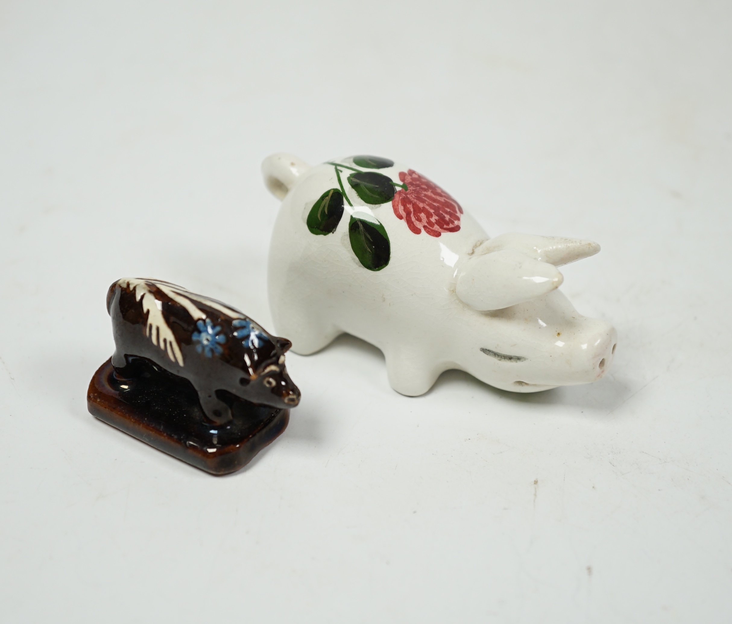 A miniature Plichta pig and a very miniature Slipware pig, Plichta pig 8cm long. Condition - fair to good